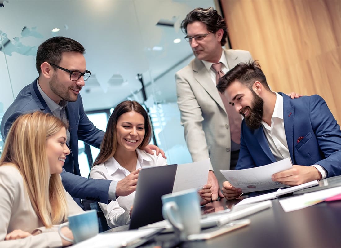 Business Insurance - Business People Working as a Team at the Office